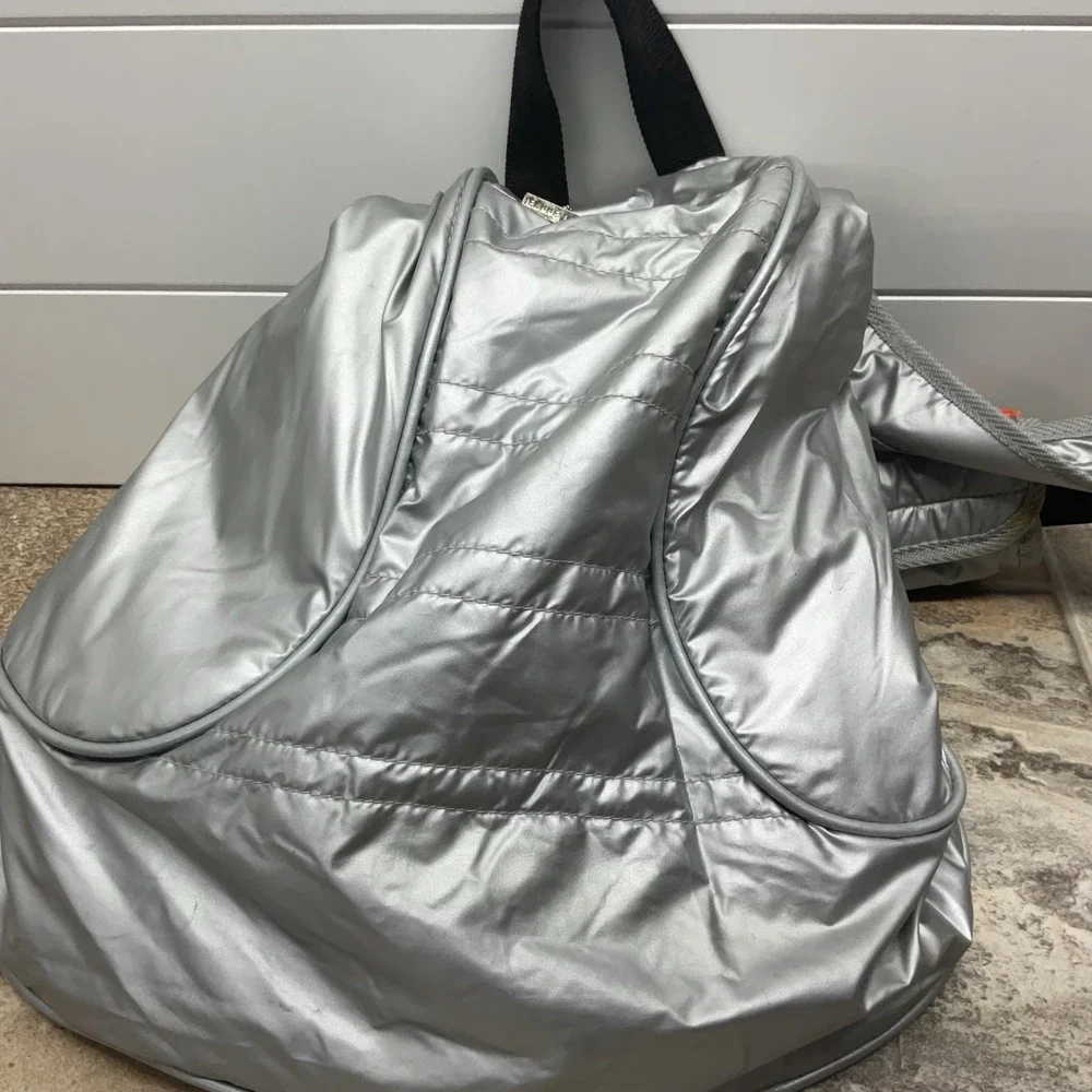 Jeanne Lottie Metallic Silver Puffer Backpack Orange Lining Techwear Y2K Bag